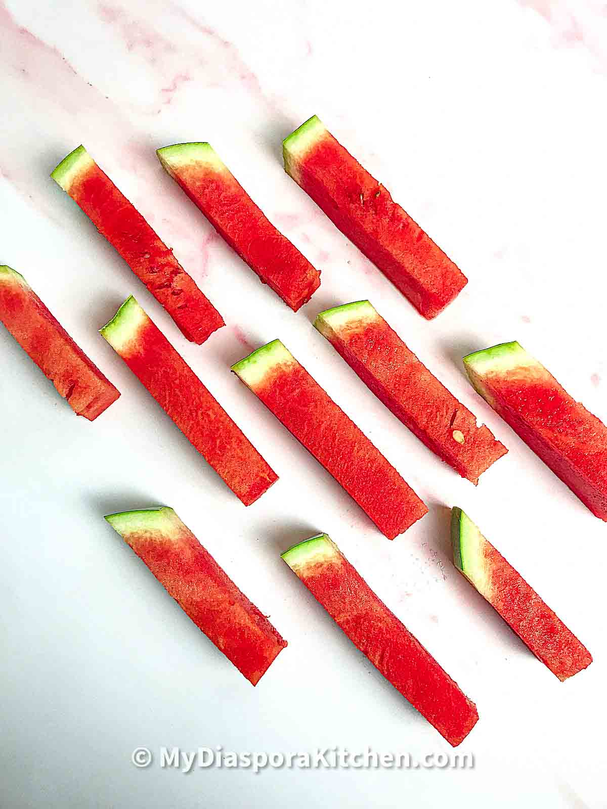 How to cut watermelon into triangles, sticks or cubes - My Diaspora Kitchen